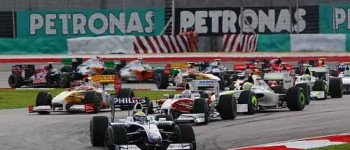 GP de Malasia: Button gana bajo el diluvio