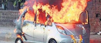 Tata Nano con problema de combustión, externa. Tata Nano con problema de combustión, externa.