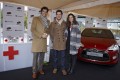 Foto 1 Citroën, Nuria Roca y Jorge Fernández con la Cruz Roja foto 1