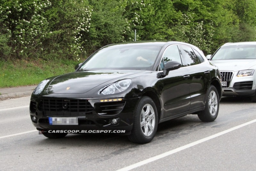 fotos-espia-el-porsche-macan-ya-monta-su-carroceria-definitiva-201211155_1.jpg
