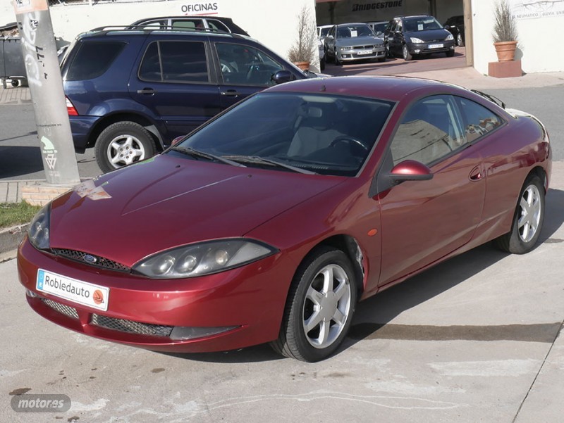Llantas de aleacion dorado  de segunda mano - ford cougar 1998 / 168.200km.